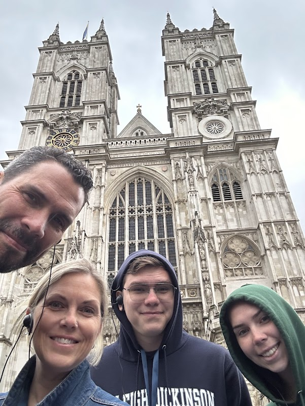 Melissa and her family in front of Westminster Abbey in London