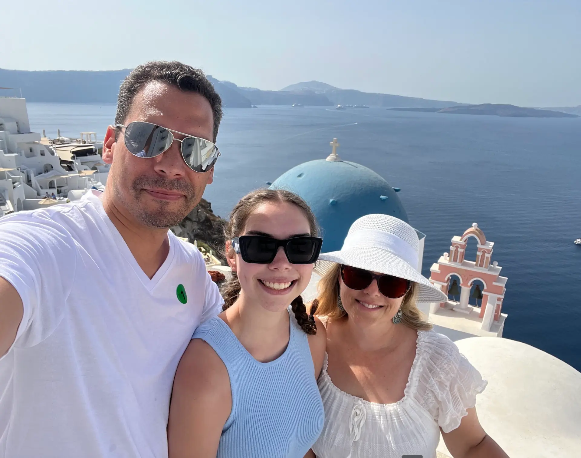 Melissa and her family overlooking the caldera in Santorini, Greece