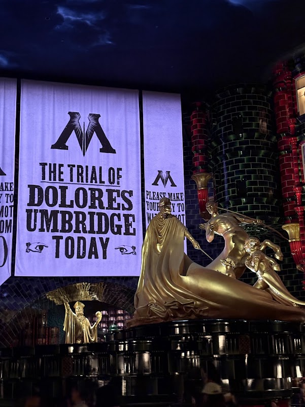 The Trial of Dolores Umbridge banners at the Ministry of Magic in Epic Universe